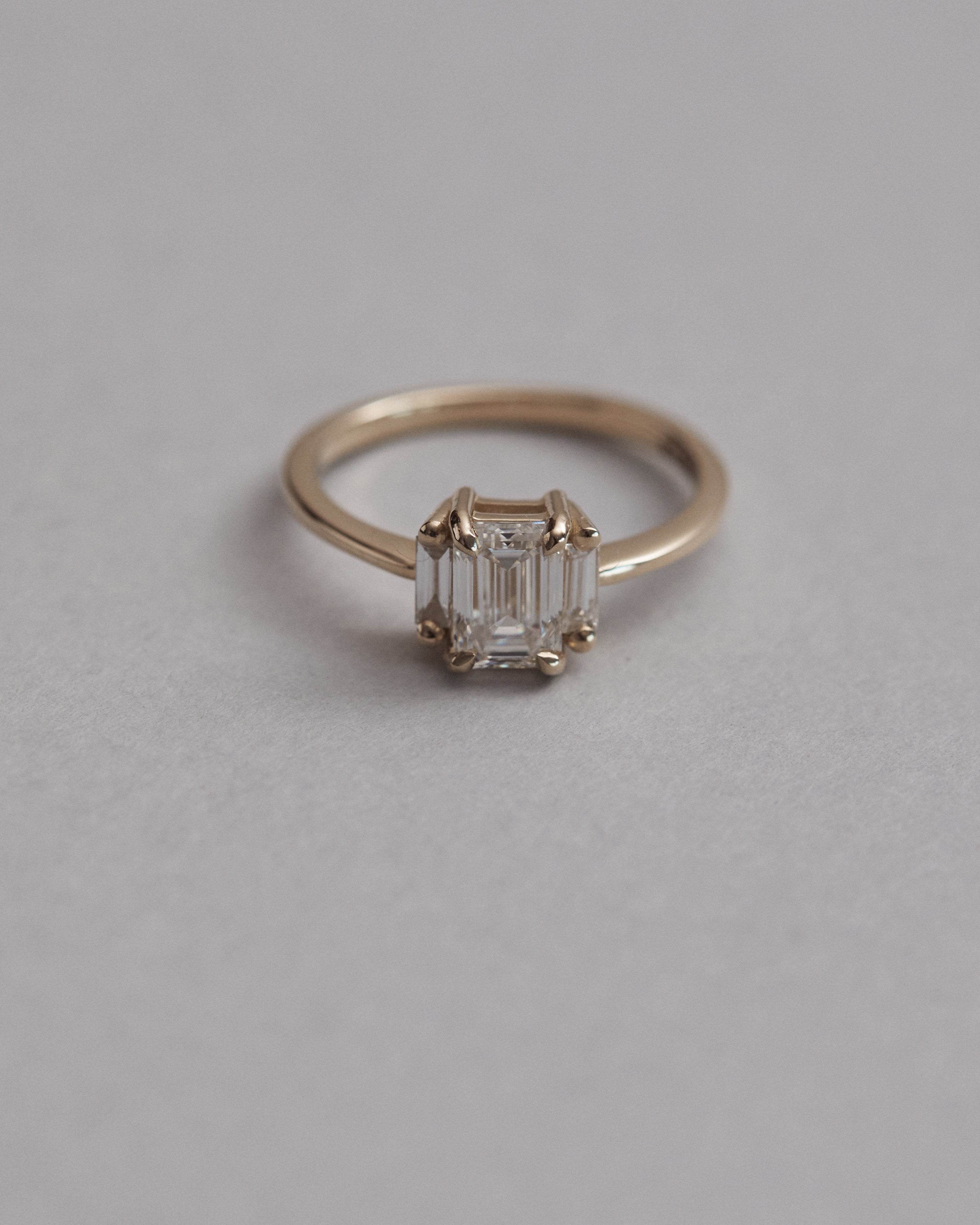 0.85ct emerald cut diamond trilogy.