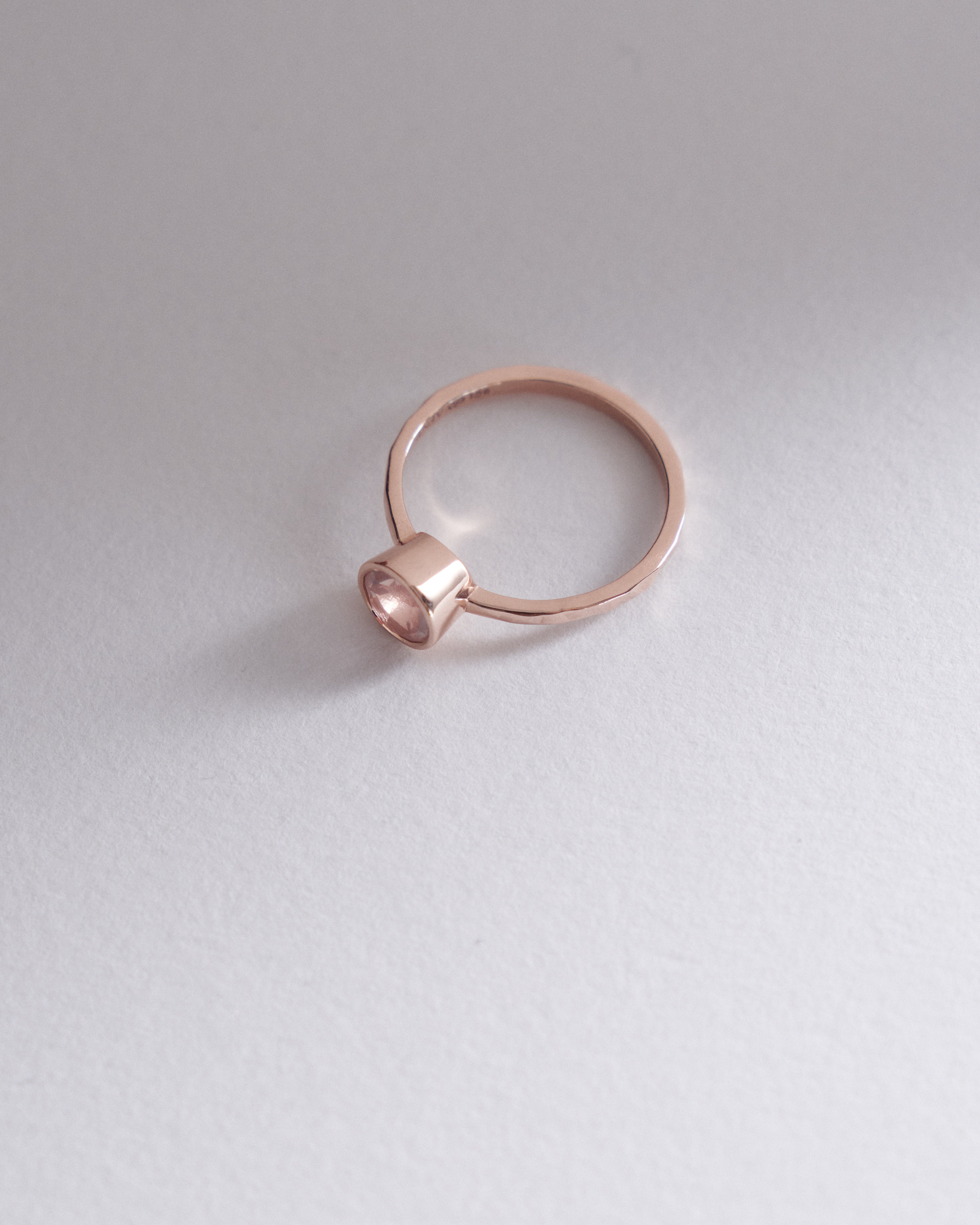 6mm round brilliant cut rose quartz dainty bezel solitaire.