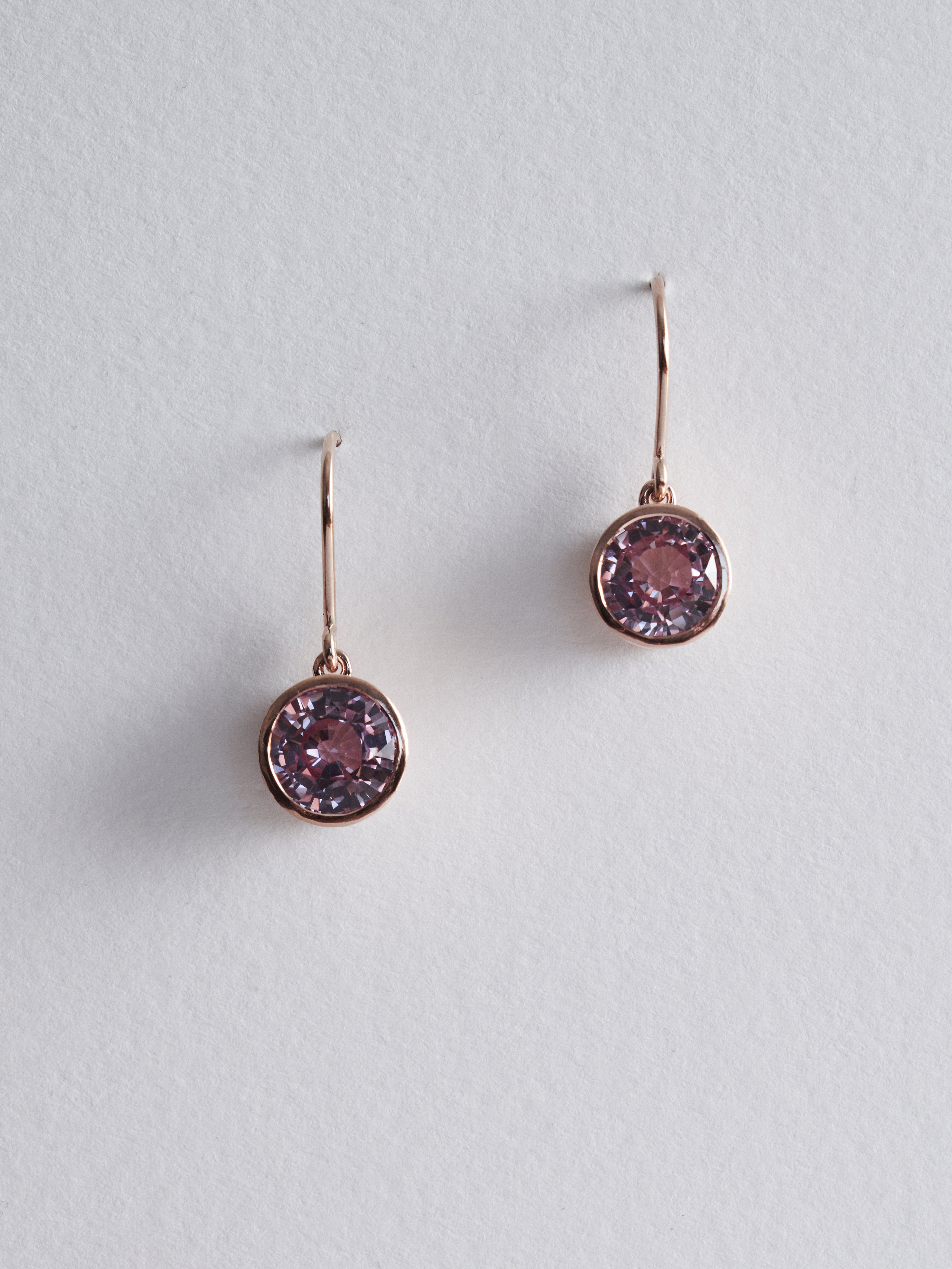 5.63ct round cut natural pale pink sapphire dangle earrings.