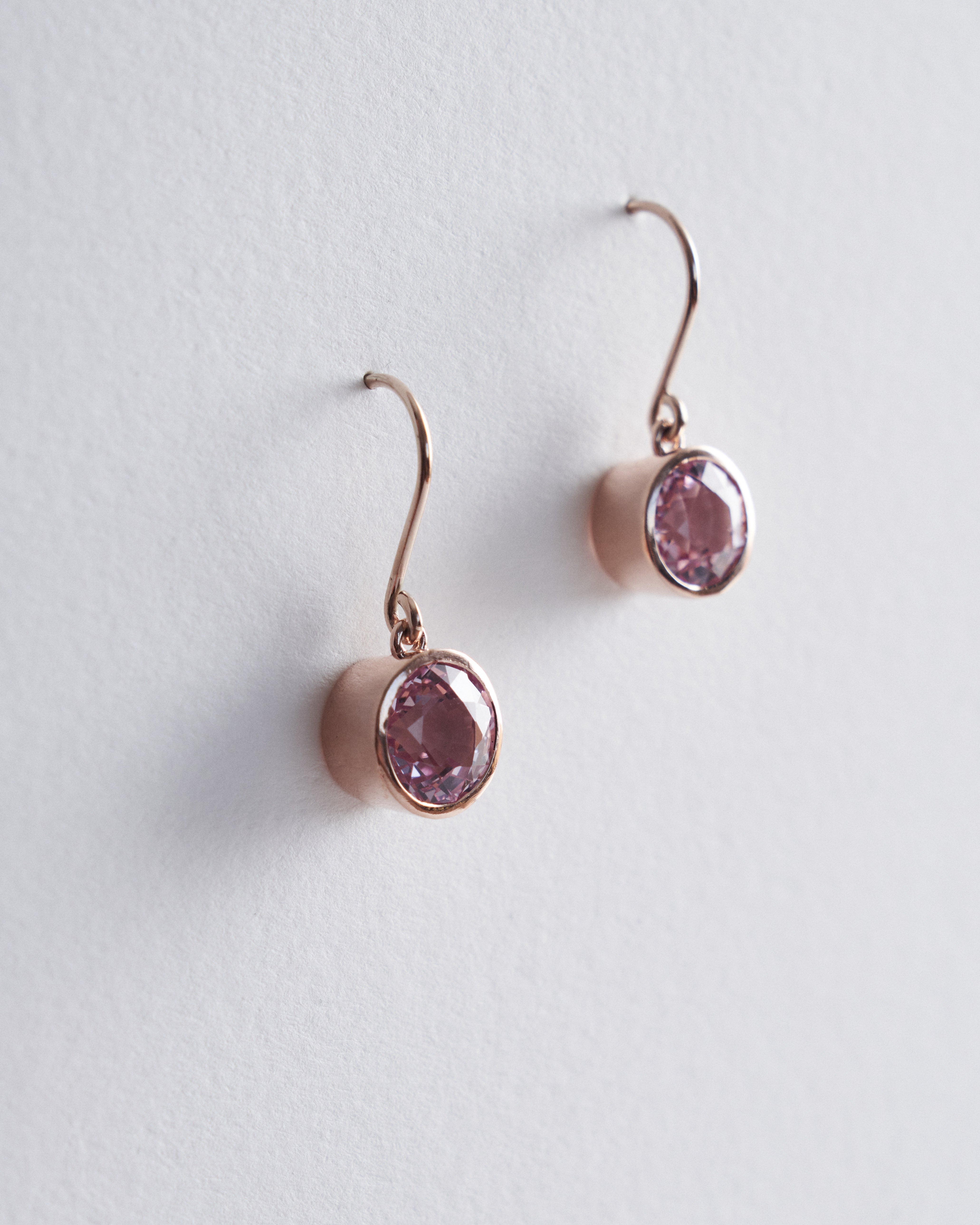 5.63ct round cut natural pale pink sapphire dangle earrings.