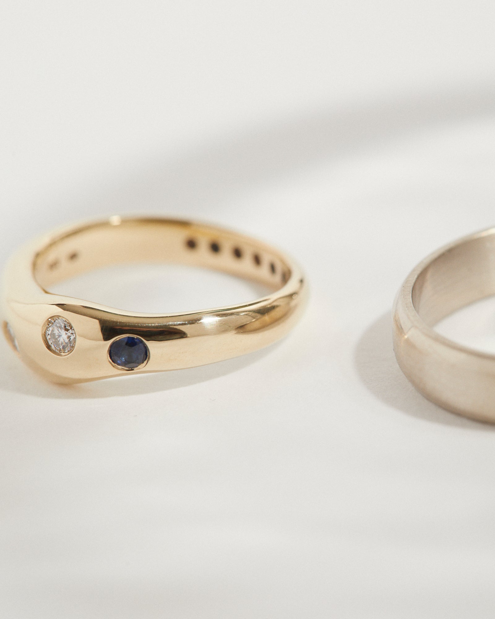 Organic wedding band with sapphire and diamonds.