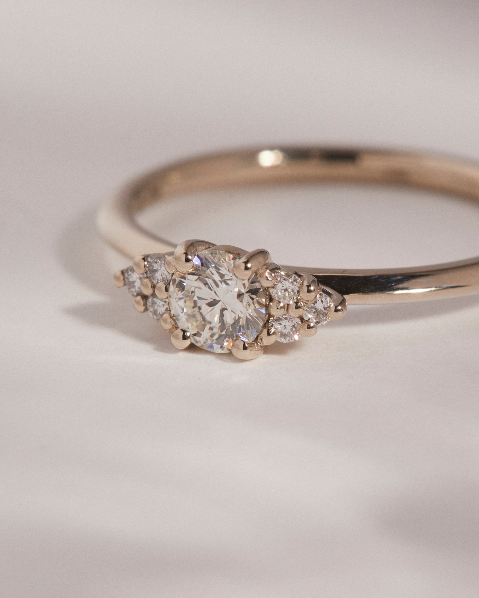 0.413ct round brilliant cut diamond cluster ring.